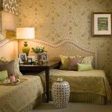 Great idea for 2 beds in 1 room use square table between, add corner shelves on top. Pin By Denice Childs On Cabin Ideas Cottage Corner Twin Beds Small Guest Room Bedroom Decor