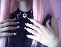 Black with pink heart, bones with purple to blue ombre nail, eye ball in the center of a ribbon nail, pastel cross on coffin nail, and corset design on pastel green. Pastel Goth Nails Gifs Get The Best Gif On Giphy