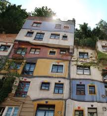 The hundertwasserhaus is a colorful apartment building near vienna's center in the landstraße district. Hundertwasserhaus In Wien