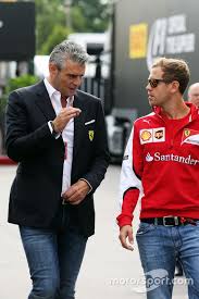 Ferrari team principal maurizio arrivabene joked that the scuderia will supply sebastian vettel with elbow pads for next season after coming off second. Maurizio Arrivabene Ferrari Team Principal With Sebastian Vettel Ferrari At Italian Gp Formula 1 Photos Ferrari F1 Season Gp Formula