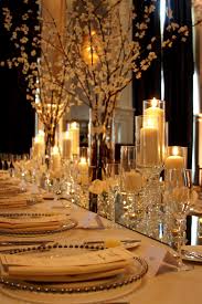 Mirror Table Runners Rather Be Antiqued Mirror Covered In Various Leveled Arrangements And Candles Mirror Table Mirrored Table Decor Candle Table