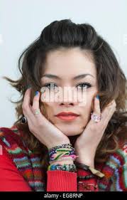 Portrait of beautiful girl half English half Thai in sport look isolated in  black and white Stock Photo