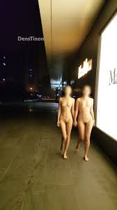 Young Chinese exhibitionist flashing - captivating public sight!