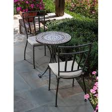 Designed For Outdoor Use This Mosaic Bistro Set Can Also Transition Indoors To Create A Cozy Space Hand Laid Outdoor Bistro Set Bistro Set Outdoor Dining Set