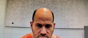 Suspect in drug investigation tied to police officer's murder receives bond  reduction