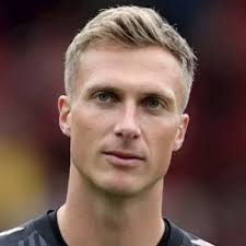 Simon Moore Salary and Contract