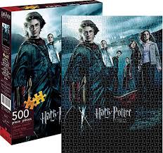 Harry, ron, hermione, hagrid, voldemort and dumbledore all huddle in the center image as hedwig the owl flies above them under a large title font of gold. Aquarius Harry Potter Goblet Of Fire Puzzle 500 Pezzi