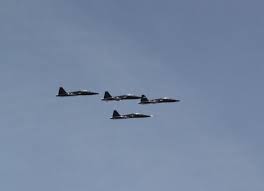 Butte County residents assemble near Oroville Hosptial for Air Force  flyover