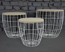 This coffee table features spacious open shelving for additional storage and display of other miscellaneous living room items like spare blankets and baskets. Metal White Coated Set Of 3 Pieces Wire Basket Side Table Buy Coffee Tables With Baskets Wooden Top Metal Wire Coffee Table Wire Drum Side Table Product On Alibaba Com