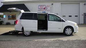 The vehicle's computer receives a signal to lock or unlock the door from a key fob or from a button on the door. 2018 Dodge Grand Caravan Se Autoability Southern Bus And Mobility