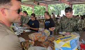 Samuel Bond and Erin Varner from NAVOCEANO's NP6 department met with  students as part of the University of Southern Mississippi Summer STEM Camp  GenSea program to learn about the capabilities of the