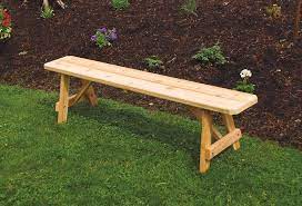 There are simple backless benches that look great along a garden path, round benches that are meant to wrap around a tree, log benches with backs and traditional benches with beautiful designs carved into their backs. Red Cedar Traditional Backless Bench From Dutchcrafters Amish