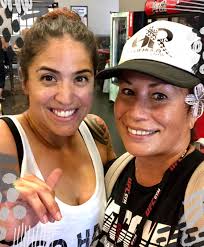 Louis and Huda at the gym. they're hot asf