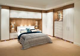 Classy small bedroom design white wall color storage ideas for small bedrooms round modern nightstand added small table lamp corner maple wood closet wardrobe striped fabric blanket small bedroom ideas can transform small box bedrooms and single bedrooms into stylish retreats. Bedroom Built Cupboard Designs Size Closets Small Bedrooms Wardrobe Fitted Wardrobes Easy Design Hpd Al Habib Panel Doors Decorpad