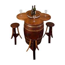 • it has a top that opens and closes on a hinge so you can use the barrel as a storage chest! Wine Barrel Table Set With Cabinet Base Buy Online In United Arab Emirates At Desertcart Ae Productid 30716372