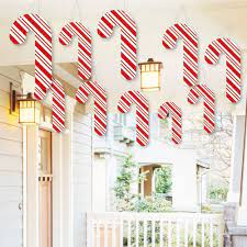 Amazon Com Big Dot Of Happiness Hanging Candy Cane Outdoor Hanging Decor Holiday And Christmas Party Decorations 10 Pieces Toys Games