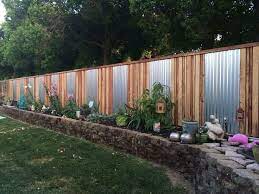 15 Privacy Fences That Will Turn Your Yard Into A Secluded Oasis Backyard Fence Ideas Privacy Privacy Fence Designs Backyard Fences