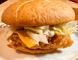 Go fishin' 🎣 Filet-O-Frank: beer battered cod topped with American cheese,  lettuce and house-made tartar sauce. *available today *gf with a bun  substitution