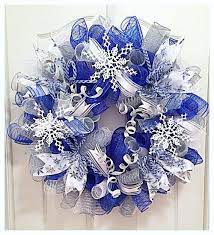 Holiday time 26 led lighted blue mesh wreath. Winter Blue Snowflake Deco Mesh Wreath Blue Snowflake Etsy Deco Mesh Christmas Wreaths Deco Mesh Wreaths Snowflake Wreath