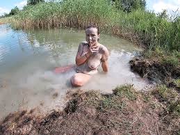 Unshaved Brunette Rubbing her Pussy with a Mud 