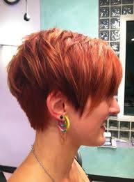Short red haircuts and asymmetry go hand in hand. Pin On Hairstyles