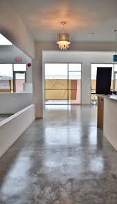 Raw Concrete Floors Naturally Look Clean And Contemporary A Simple Inexpensive Process With Concrete Sealers Waxes Perfect For Commerical Or Resi Concrete Interiors Concrete Floors