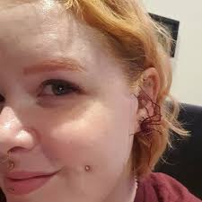 Plastic Spider as an Earring