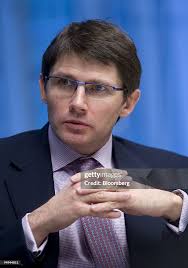 Adrian Pope, partner with Maples and Calder, speaks during a... News Photo 