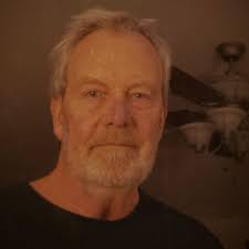 How to remove a stuck screw from a band saw?