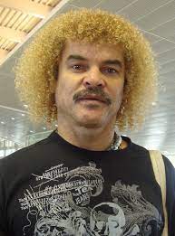 The idol of the colombia team appears handing out flowers and dancing in the popular neighborhood of pescaíto. Carlos Valderrama Wikipedia
