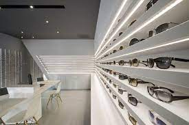 Types Of Lighting Fixtures For Retail Stores Zen Merchandiser Store Design Interior Shop Interior Design Optical Shop