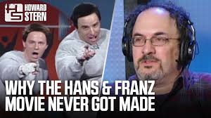 Why didn’t a Hans & Franz movie get made? Robert Smigel tells Howard about  the script he wrote based