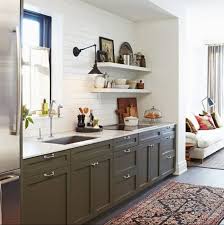 4 Earth Tones To Make Your Kitchen More Grounded Big Chill Green Kitchen Cabinets Kitchen Inspirations Home Kitchens