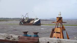 Coastal communities told to remain vigilant for floods as wind warnings lifted