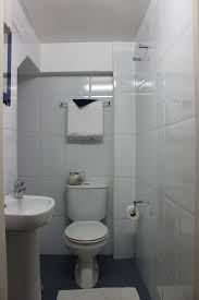 Doors like these do not use up valuable floor space when left open so you can have more room for bathroom features and fixtures. Very Small Bathroom Ideas With Shower Only Very Small Bathroom Small Bathroom Layout Small Bathroom With Shower