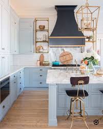 light blue paint, marble and brass