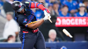 Vladimir Guerrero Jr. celebrates an unusual double-hit RBI single for the Toronto Blue Jays