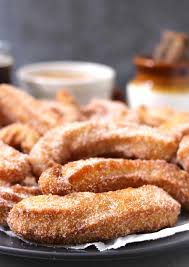 Marranitos (mexican gingerbread pigs) capirotada (mexican bread pudding) easy pumpkin empanadas; Churros Cook With Kushi