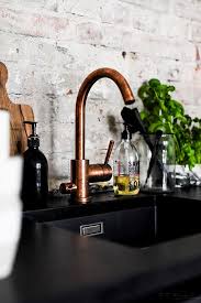 Dark hardwood floors also work to anchor the room. 8 Black Sink Ideas Black Sink Kitchen Remodel New Kitchen