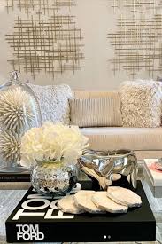 Try a different kind of coffee table Silver Elephant Candle Coffee Table Books Decor Coffee Table Living Room Modern Coffee Table Books