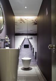 A laconic guest toilet with aqua tiles, copper touches and a floating vanity with a sink. Decorating For Small Spaces Powder Room Ideas Powder Room Ideas Pinterest Powder Room Ide Bathroom Wallpaper Modern Small Toilet Room Small Bathroom Vanities