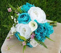 We did not find results for: Silk Wedding Bouquet Teal Bouquet Real Touch Bouquet Silk Etsy In 2021 Teal Bouquet Turquoise Bouquet Turquoise Wedding Flowers