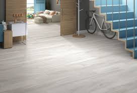 A Low Cost Option For A High End Look Valente Gris Is A Rectified Porcelain Wood Look Tile From Spain Wood Grain Tile Faux Wood Tiles Wood Look Tile