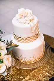 Maybe you would like to learn more about one of these? Great Gatsby Wedding Ideas Simple And Elegant 1920 S Inspired Wedding Cake Goldweddingcakes Gatsby Cake Wedding Cake Pearls Cool Wedding Cakes