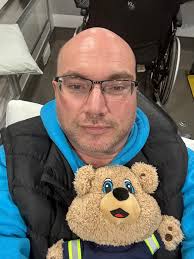 Red spoon taken by twin sister