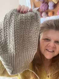 How to adjust the Snowy Wheat Puff Beanie pattern for a thinner yarn?