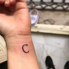 What constitutes a letter tattoo? Otra C Tattoo Tattoos Blackwork Blackworktattoo Linetattoo Machinetattoo Tatuaje Tatuajes Blackworktattoos Letter C Tattoo Body Art Tattoos C Tattoo
