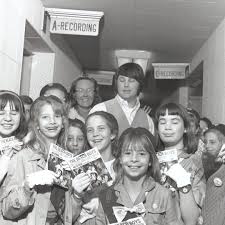 1965: Brian outside the recording studio with a local Girl Scout troop,  promoting the new Beach Boys single, “The Little Girl I Once Knew.”