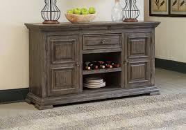 During dinner parties or holidays, you can place hors d'oeuvres, mains, sides and drinks onto a server so your dinner table is free from clutter. Wyndahl Rustic Brown Dining Room Server Louisville Overstock Warehouse