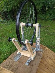 The stand is adjustable to accomodate different hub widths. My Diy Wheel Truing Stand No More Zip Ties On The Frame And Fork For Me Bicycling